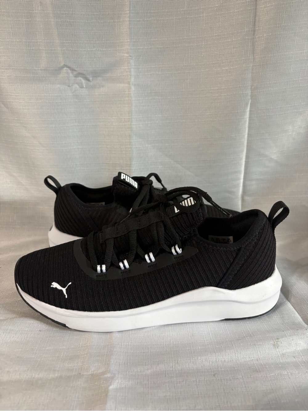 Puma Black and White Knit Slip-On Sport Sneakers